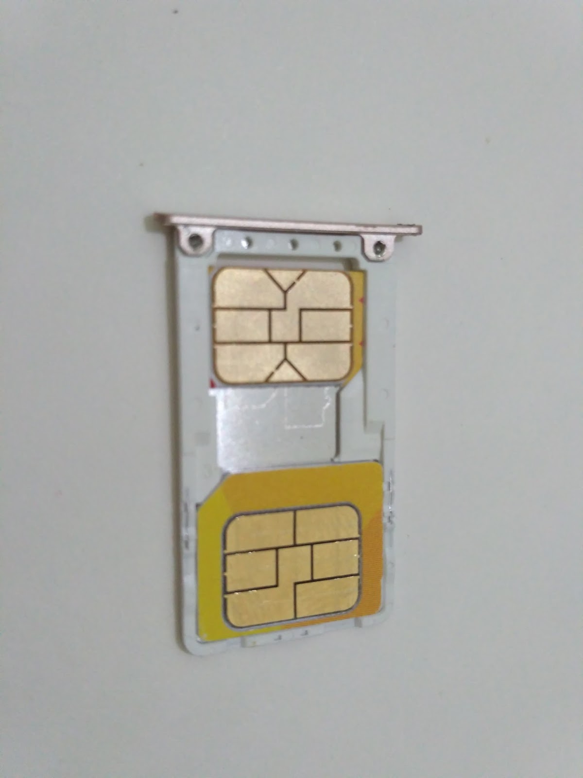 cara membuka slot sim card xiaomi yang macet